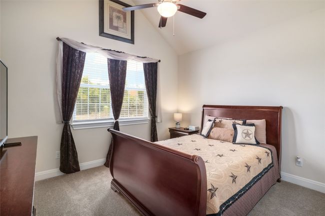 Ceiling fan, the must-have tall ceiling and plenty of natural light that fills the room. | Image 22