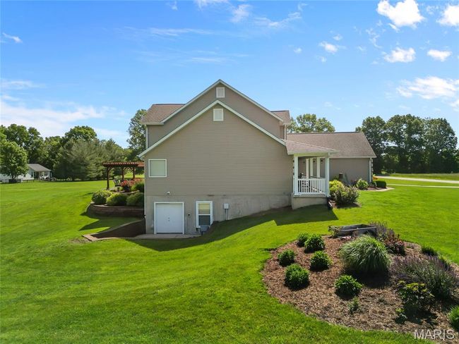 2nd concrete pad from walk out wired for hot tub or outdoor kitchen | Image 40