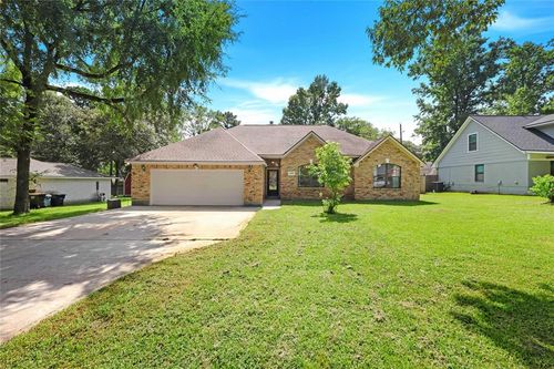 2009 Coe Rd, Pinehurst, TX, 77362-2537 | Card Image