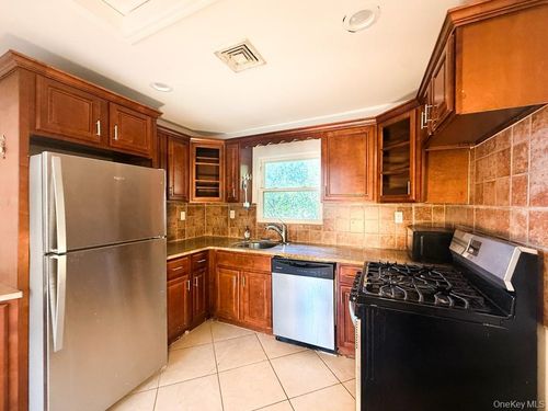 122 Combs Ave, Woodmere, NY, 11598-1414 | Card Image