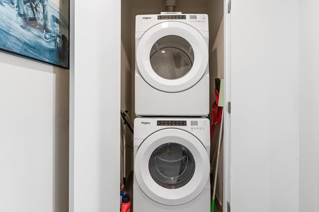 Laundry area with stacked washer / dryer and laundry area | Image 21