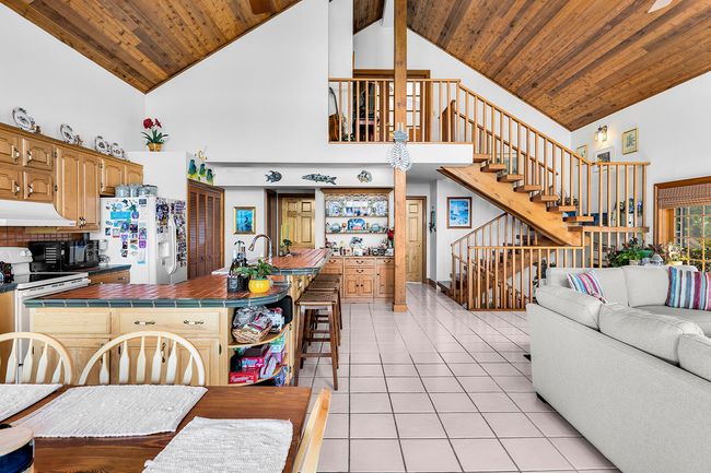 Hardwoods and tiled throughout | Image 23