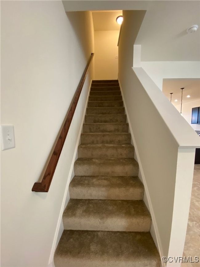 Staircase featuring baseboards | Image 8