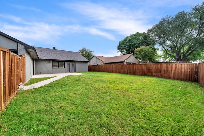 View of yard with a patio | Image 29