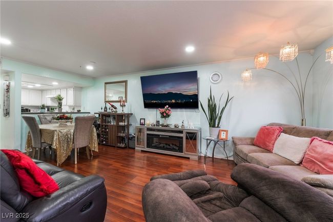 Living area featuring recessed lighting and wood finished floors | Image 5