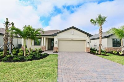 18293 Ridgeline Dr, House other with 3 bedrooms, 3 bathrooms and null parking in Estero FL | Image 1