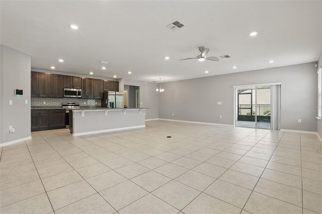 15250 Aquarius Way, House other with 3 bedrooms, 2 bathrooms and null parking in MASCOTTE FL | Image 5