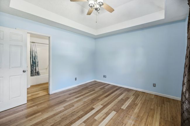 Sunlight streams through the double windows, adorned with tasteful curtains, creating a serene and inviting atmosphere! 2095 Bolden Drive, Murfreesboro, TN 37127 | Image 16