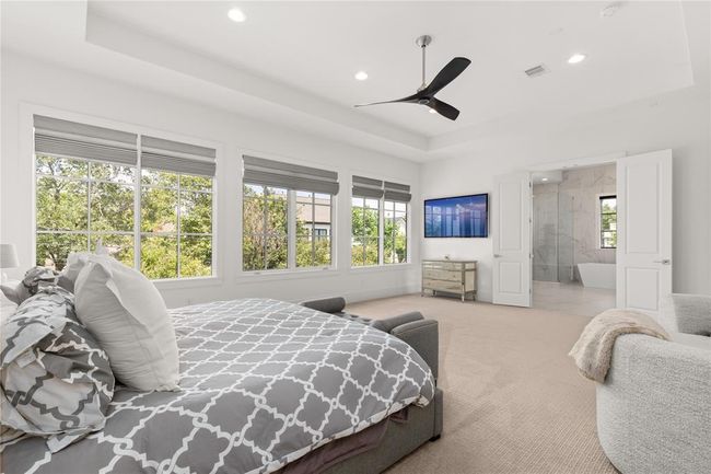 Tray ceiling w/ recessed lighting, Minka Aire 6-speed ceiling fans, & custom shades. | Image 31