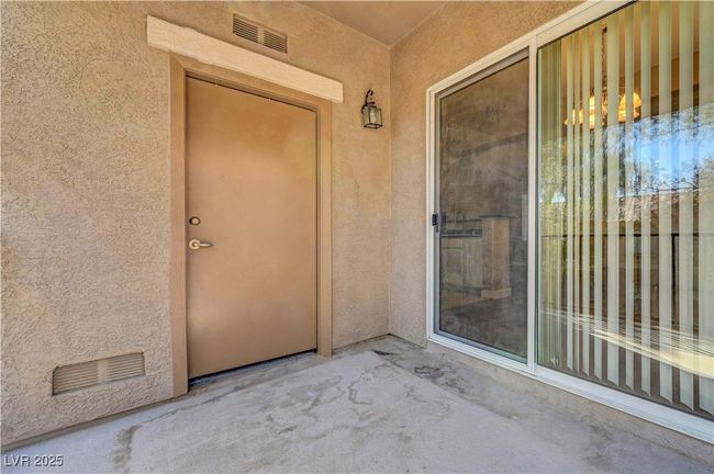 View of exterior balcony with ample storage/utility room | Image 25