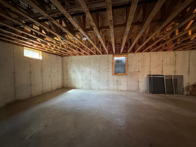 Unfinished basement with egress window | Image 42
