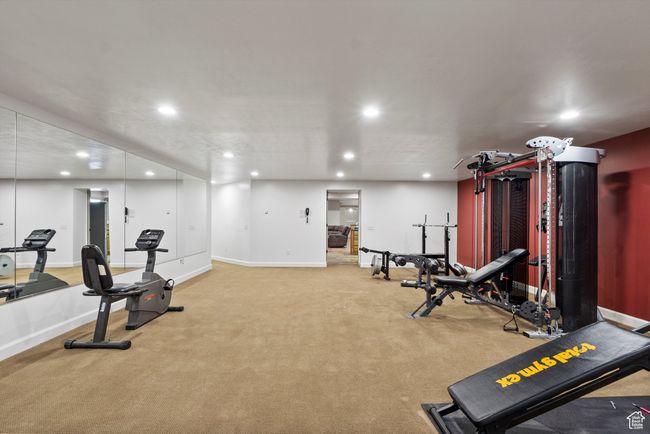 Workout room featuring recessed lighting, baseboards, and carpet flooring | Image 64