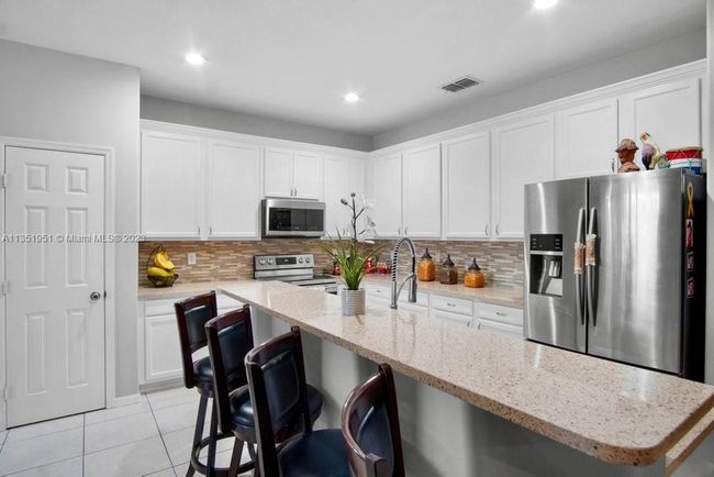 5806 Nw Breezy Brook Ct, House other with 3 bedrooms, 2 bathrooms and null parking in Port St. Lucie FL | Image 10