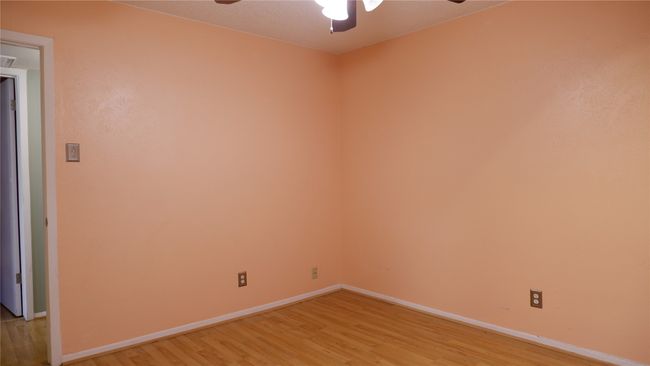 Unfurnished room featuring ceiling fan and light wood-type flooring | Image 11