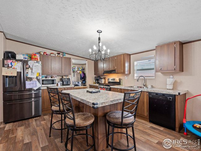 216 Osage Dr, House other with 4 bedrooms, 2 bathrooms and null parking in Log Lane Village CO | Image 6