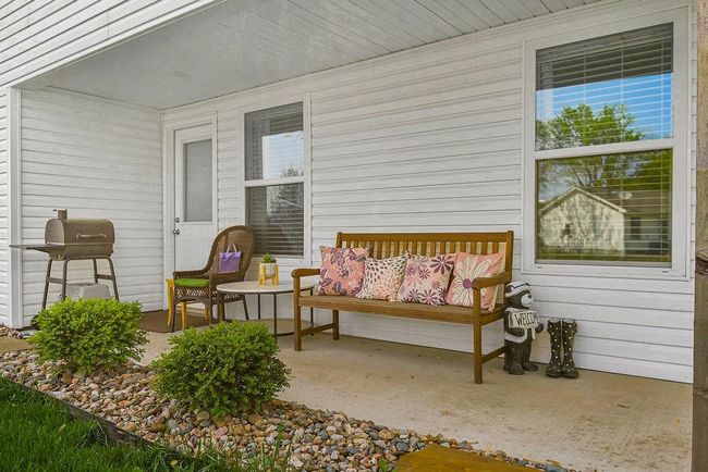 View of patio featuring area for grilling | Image 29