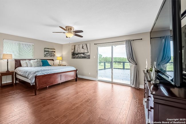Primary Bedroom/Main Level/opens to covered patio | Image 16