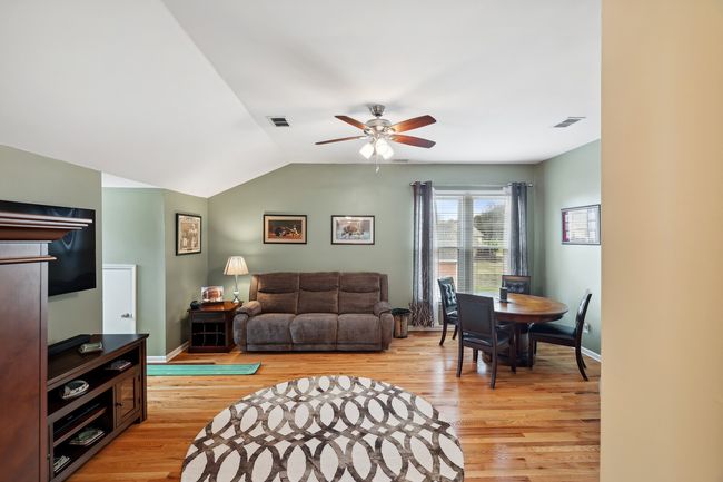 Just down the hall, the bonus room features high ceilings, and offers plenty of space for a theater area or recreation room, and also has 3 large storage areas. | Image 35