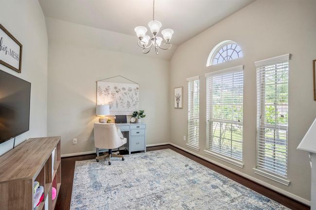 This versatile flex space, with large windows overlooking the front yard, offers a bright spot for a home office, formal dining, or whatever suits your lifestyle. | Image 5