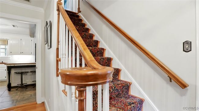 Stairs featuring ornamental molding | Image 16