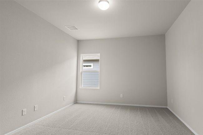 Unfurnished room with light carpet, baseboards, and visible vents | Image 14