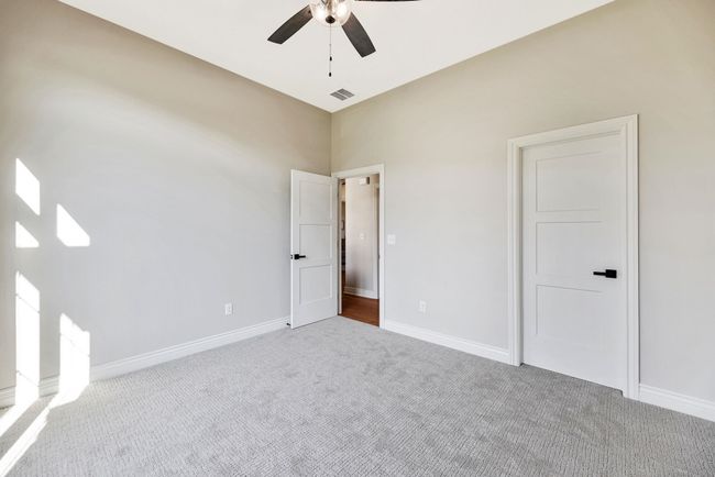 Interior space with ceiling fan | Image 29
