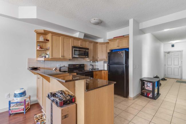611 - 1507 Centre A Street Ne, Home with 2 bedrooms, 2 bathrooms and 1 parking in Calgary AB | Image 4