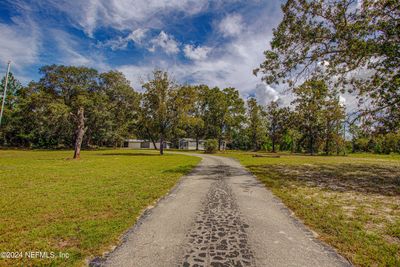 7677 Oak Forest Road, House other with 3 bedrooms, 2 bathrooms and null parking in Keystone Heights FL | Image 2