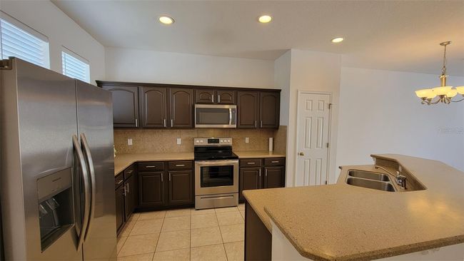 7332 Yoder Street, Townhouse with 3 bedrooms, 2 bathrooms and null parking in Windermere FL | Image 2