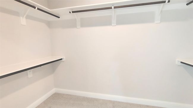 Stock Photo Primary Spacious Closet | Image 14