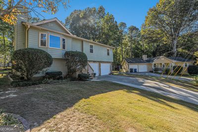 2490 Suncrest Court, House other with 4 bedrooms, 2 bathrooms and 2 parking in Buford GA | Image 2