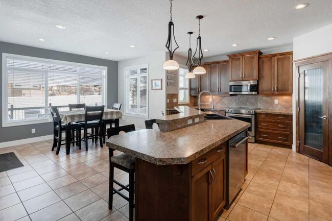 238 Kingsbury View Se, Home with 4 bedrooms, 3 bathrooms and 4 parking in Airdrie AB | Image 9
