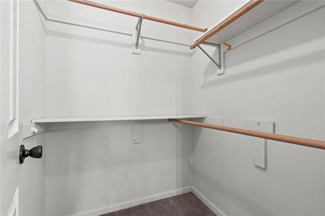 Walk in closet with carpet | Image 23