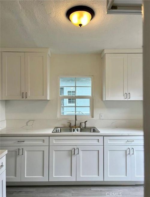 3842 Walton Ave, Los Angeles, CA, 90037-1144 | Card Image