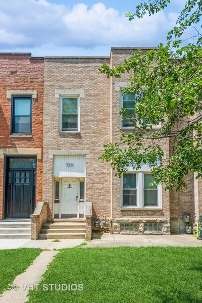 920 S Bishop Street, Home with 6 bedrooms, 3 bathrooms and 2 parking in Chicago IL | Image 1