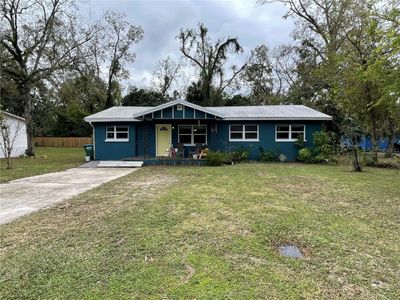 25145 Nw 5 Th Avenue, House other with 4 bedrooms, 3 bathrooms and null parking in NEWBERRY FL | Image 1