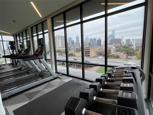 Gym with a city view and floor to ceiling windows | Image 25