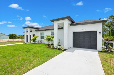 2420-2422 Ansel Ave S, Home with 6 bedrooms, 4 bathrooms and null parking in Lehigh Acres FL | Image 2