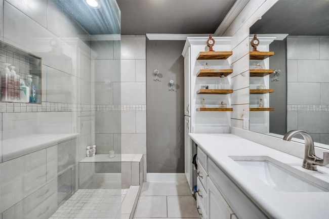 Primary bath features oversized walk in shower | Image 13