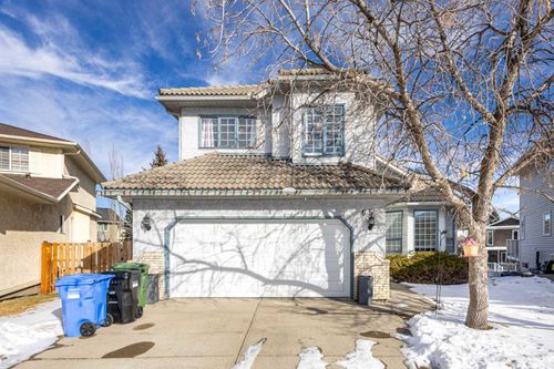 65 Scanlon Hill Nw, Home with 4 bedrooms, 3 bathrooms and 4 parking in Calgary AB | Card Image
