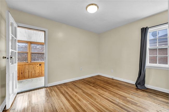 Unfurnished room featuring baseboards and light wood finished floors | Image 37