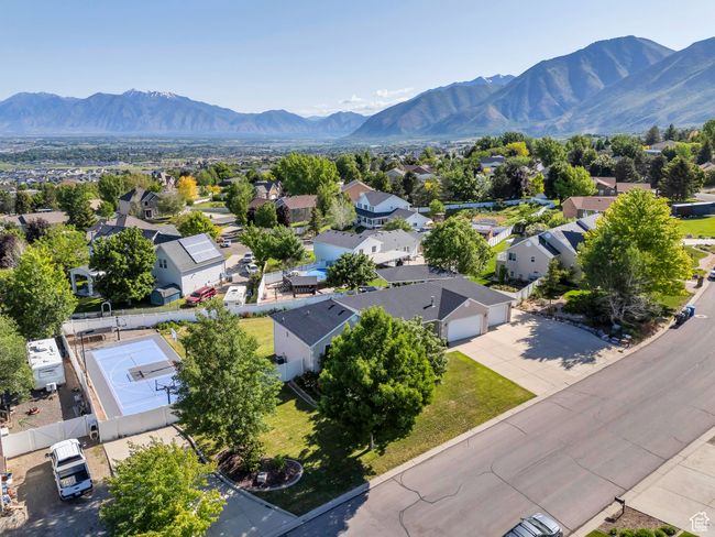 Aerial view of residential area with mountains | Image 32