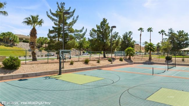 View of sport court with community basketball court and fence | Image 69