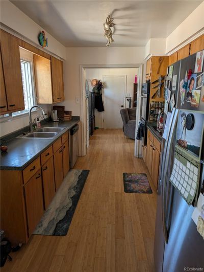 Kitchen - Poplar Cabinets - Access to Family Room and Garage | Image 3