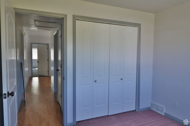 Corridor with baseboards and dark wood-style floors | Image 34