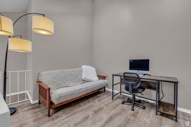 Office space with baseboards and wood finished floors | Image 15