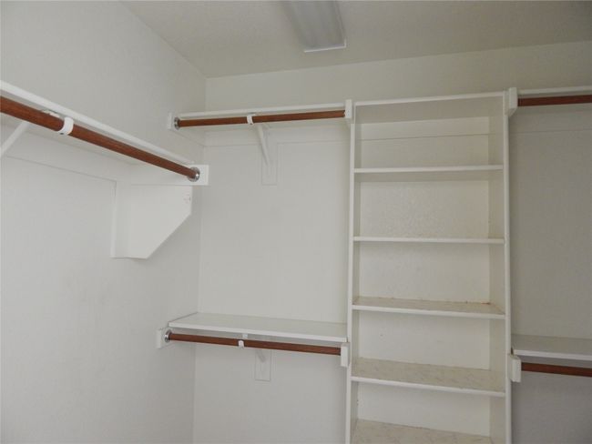 View of walk in closet | Image 14