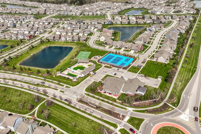 Amenities include multiple swimming pools, a fitness/workout center, playgrounds, a 15-acre park, dog park, racquet courts, a clubhouse w/ banquet facilities, miles of biking and walking paths and more! | Image 47