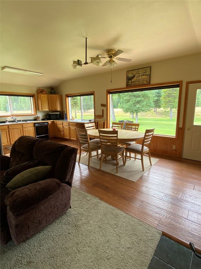 ceiling fan, and light wood-style floors | Image 25