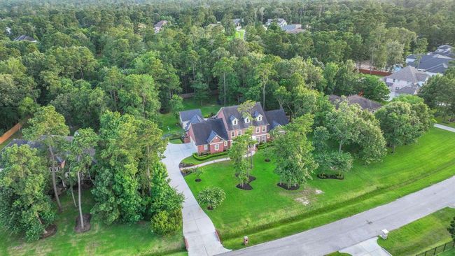 Conveniently located to shopping, retail and restaurants, Bender's Landing Estates is within in minutes to Grand Parkway (99), Hardy Toll Road, I-45 and only 20 minutes from The Woodlands Town Center - home to The Cynthia Woods Pavillion. Zoned to top-notch CISD schools! | Image 48